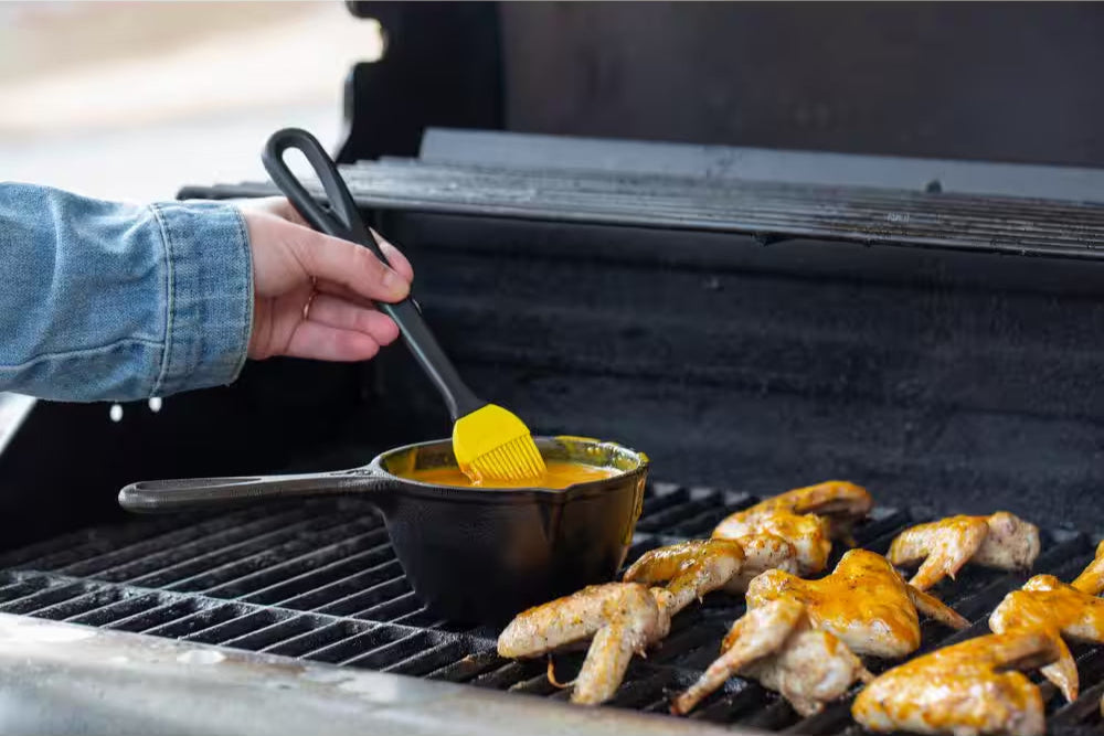 0.5 Qt. Cast Iron Melting Pot in Black with Silicone Brush